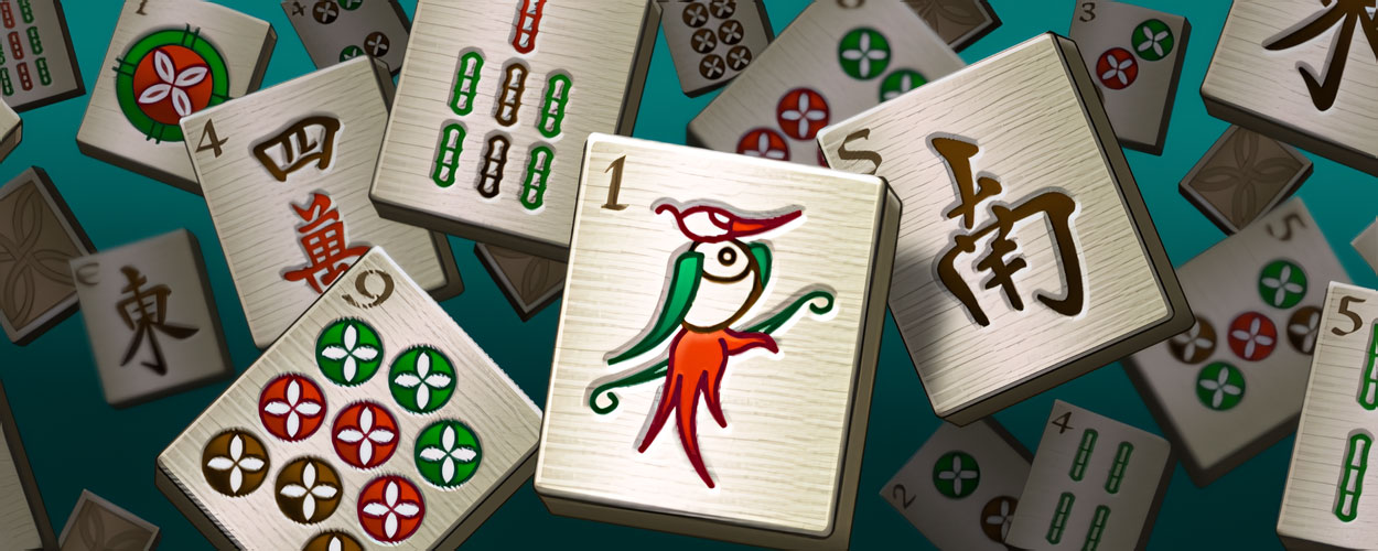 Scattered Mahjong tiles of a pair matching memory game